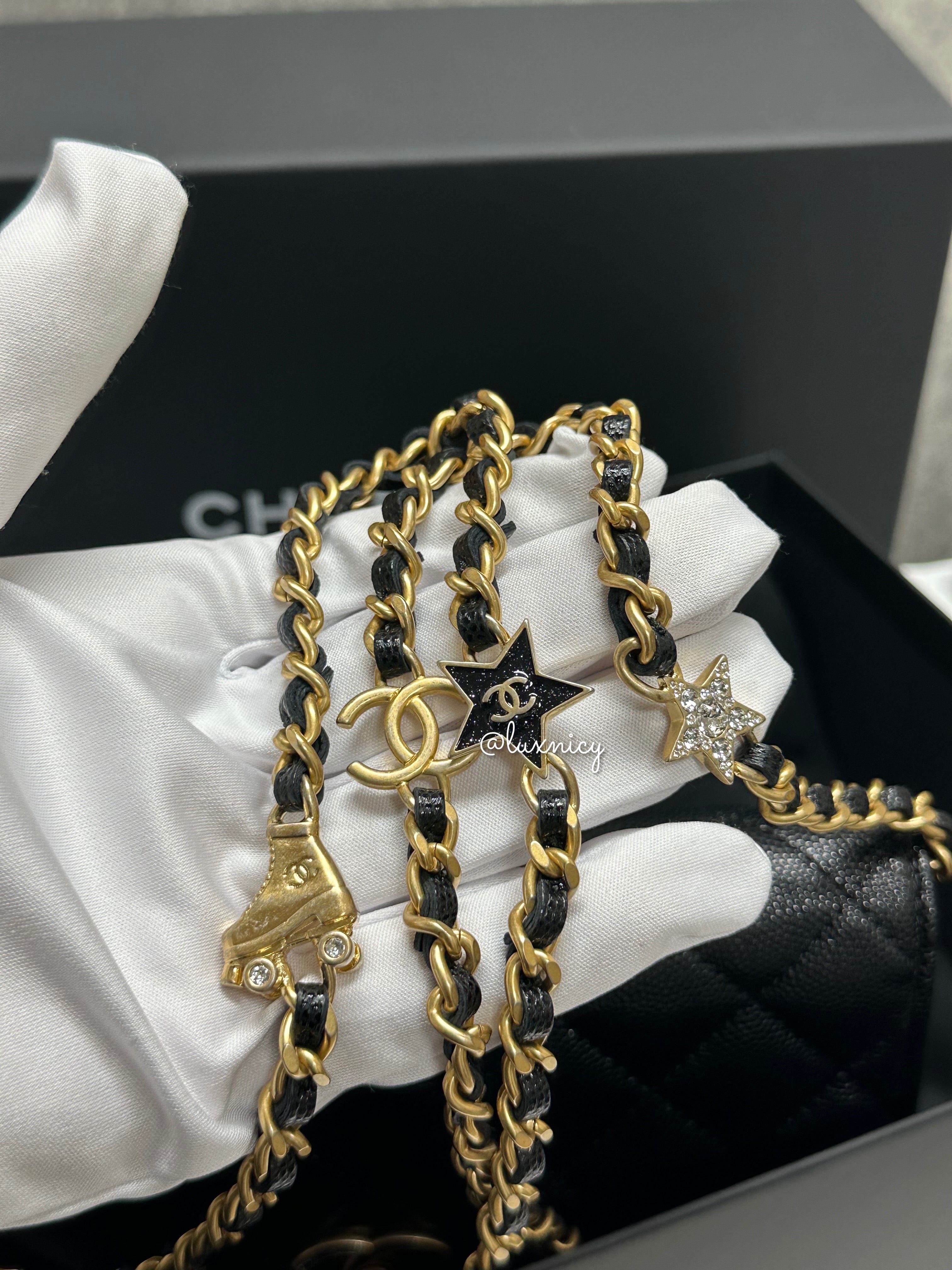 Chanel 24c black caviar chain with charms WOC